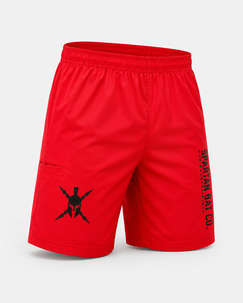 Red shorts with a black logo and text on a light gray background